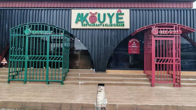 The frontage: the restaurant’s green door, the club’s red door